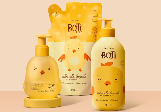 Three yellow Boti Baby liquid soap products featuring a cute chick illustration.