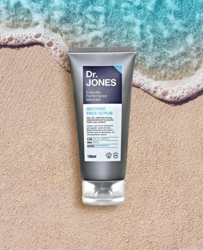 imagem embalagem de produto Dr. Jones na areia da praia. Produto com embalagem cor-de-cinza, o mar na parte de cima e areia embaixo