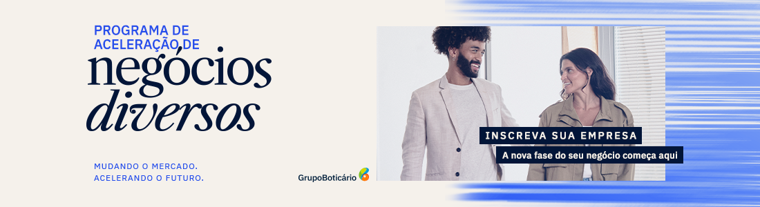 A imagem é uma propaganda do "Grupo Boticário" para um programa de aceleração de negócios diversos. À esquerda, em destaque, está o texto "programa de aceleração de negócios diversos" em azul claro e preto elegante. Abaixo, em letras menores, lê-se "MUDANDO O MERCADO. ACELERANDO O FUTURO.". O logotipo colorido do "Grupo Boticário" aparece na parte inferior central. À direita, uma foto de um homem negro e uma mulher sorrindo um para o outro sobrepõe uma faixa azul abstrata. Sobre a imagem, em letras brancas dentro de uma caixa preta, está escrito "INSCREVA SUA EMPRESA". Abaixo, em letras brancas menores dentro de outra caixa preta, lê-se "A nova fase do seu negócio começa aqui". A propaganda visa atrair empresas diversas para participar do programa de aceleração oferecido pelo Grupo Boticário.